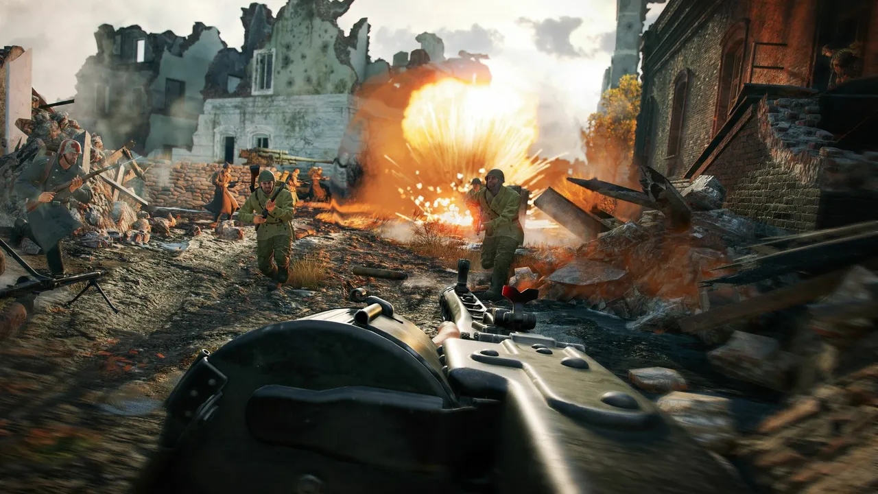 Enlisted official screenshot: soldiers fighting through a ruined town as an explosion erupts ahead