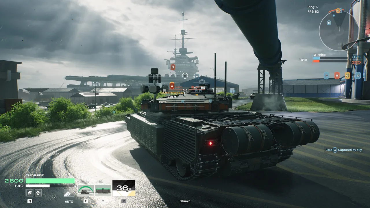 World of Tanks HEAT official screenshot: a tank parked in a base courtyard, shown with the game's HUD